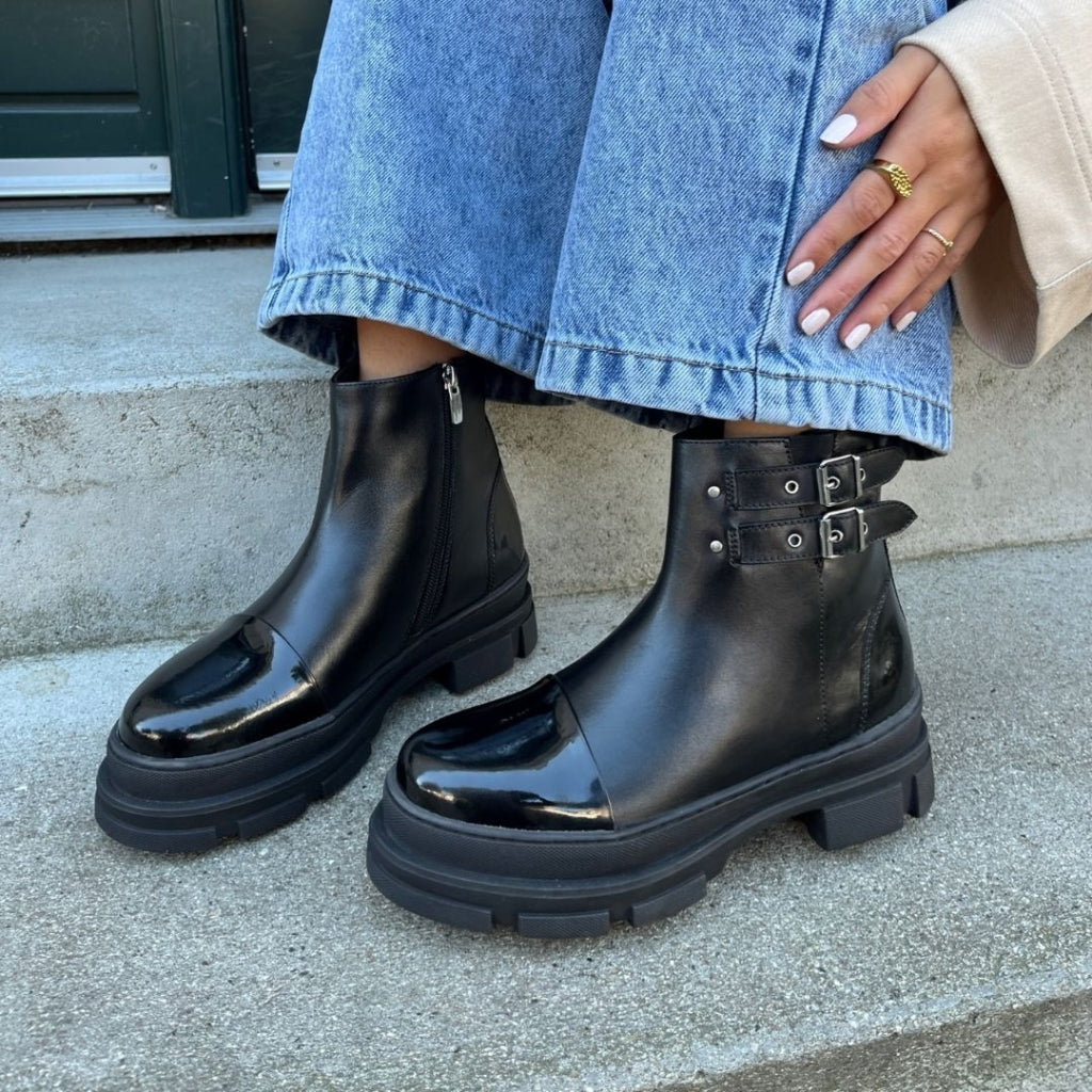 Black heeled patent boots on sale